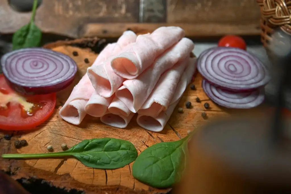 Maple end-grain cutting board with a knife